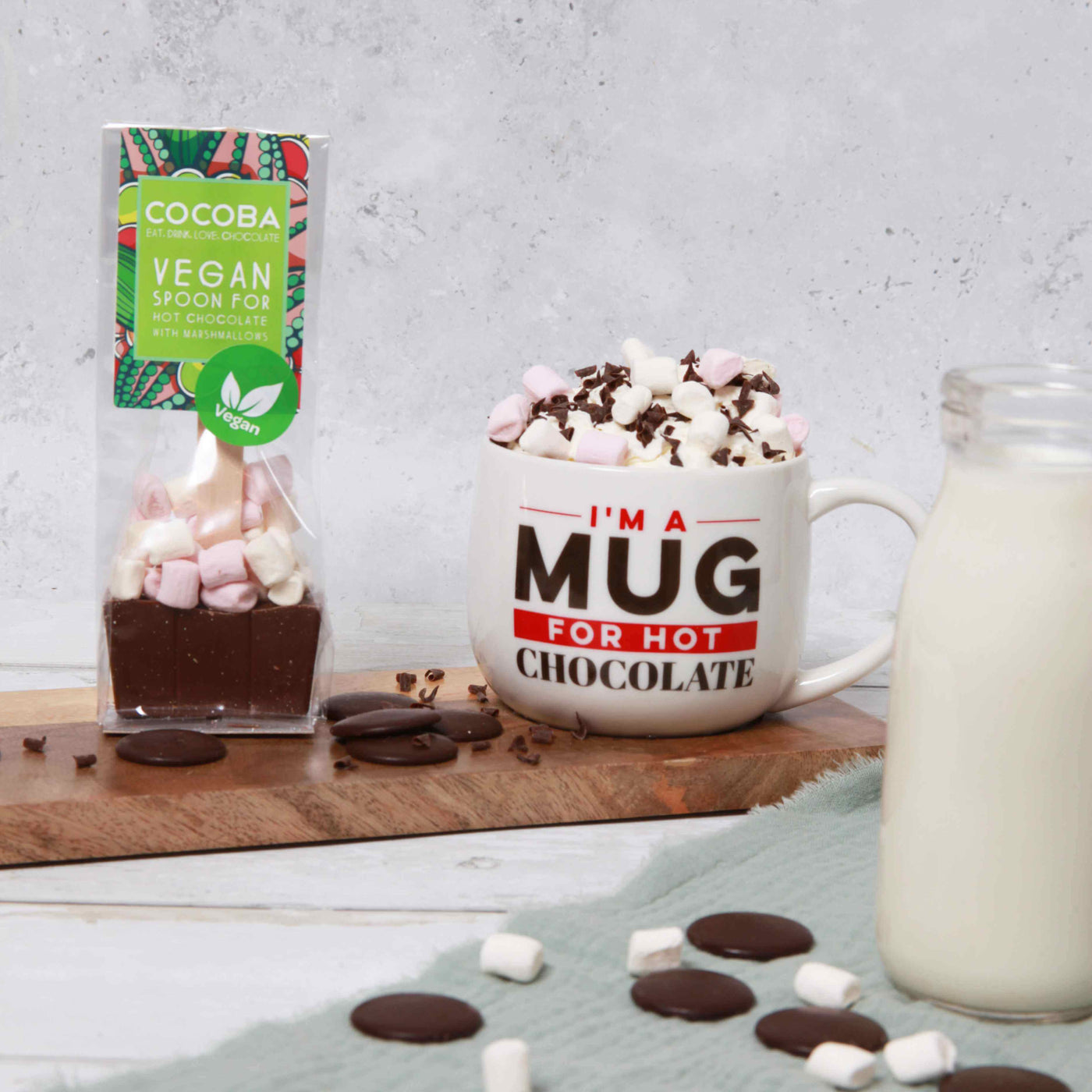 Vegan milk hot chocolate spoon and a hot chocolate