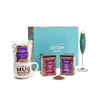 Cocoba chocolate gift set with mug, packaging, and mixer on a white background