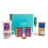 Cocoba chocolate gift set with mug, packaging, and mixer on a white background