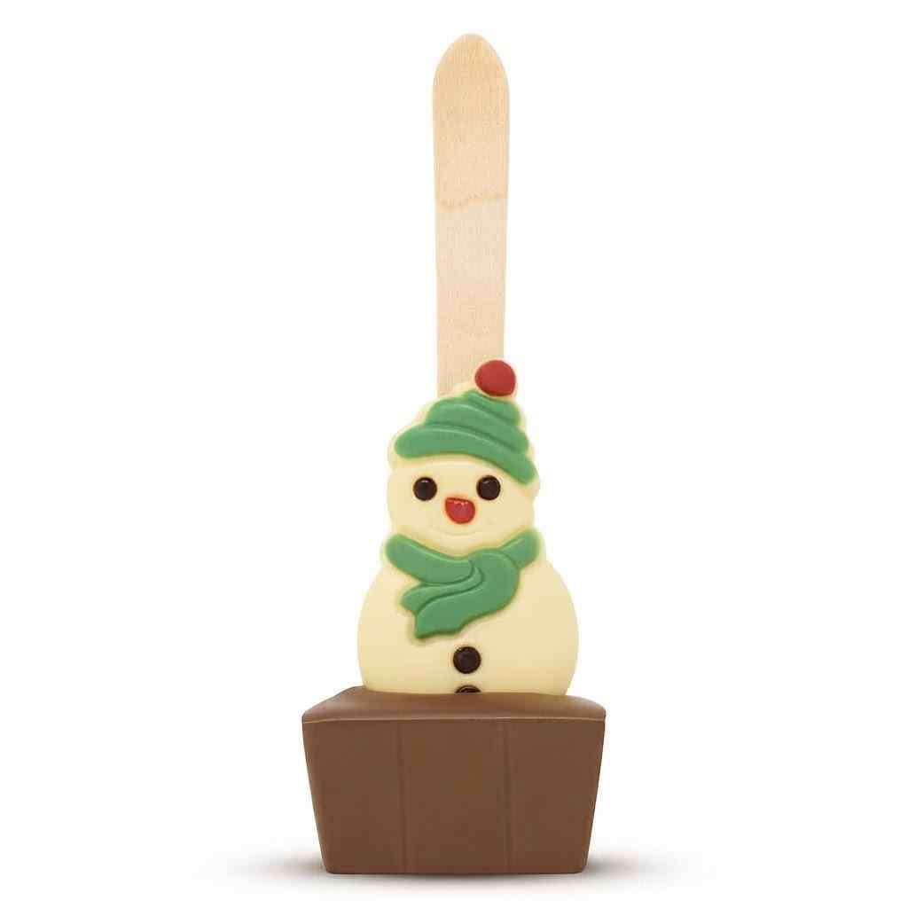 A novelty chocolate-covered stick with a snowman decoration on top, set against a plain white background.