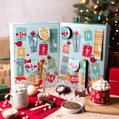 Cocoba Christmas Hot Chocolate Advent Calendar with hot chocolate bombes, hot chocolate spoons, drinking chocolate flakes and more.