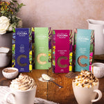 Selection of Cocoba Drinking Chocolate Flakes for luxury hot chocolate at home. 45% Dark Milk flakes, White flakes, Signature 55% dark vegan flakes, Salted Caramel Flakes.