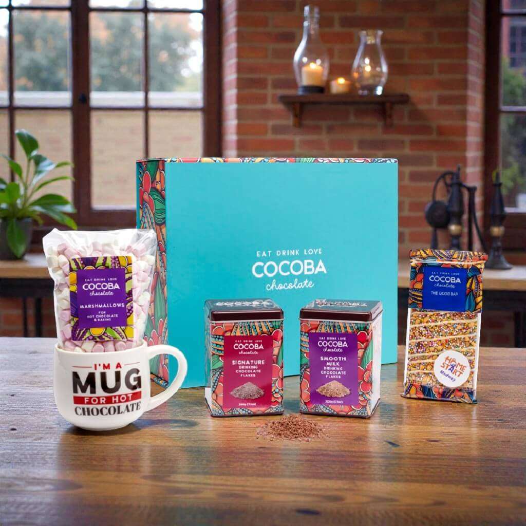 Hot Chocolate Maker’s Gift Box on a wooden cosy kitchen background. 