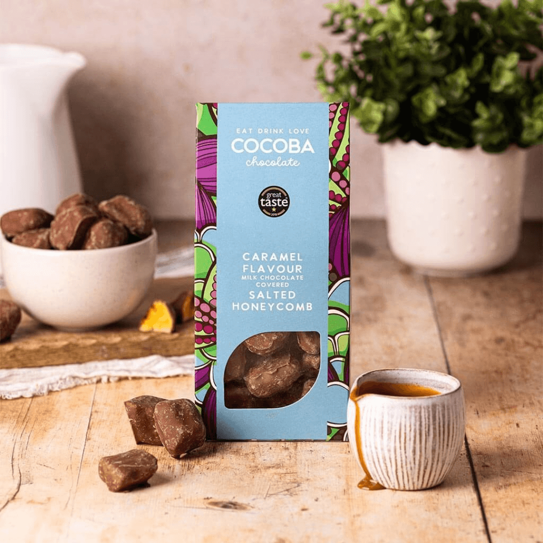Salted Caramel Milk Chocolate Covered Honeycomb on wooden background with Salted Caramel Milk Chocolate Covered Honeycomb in a bowl. 