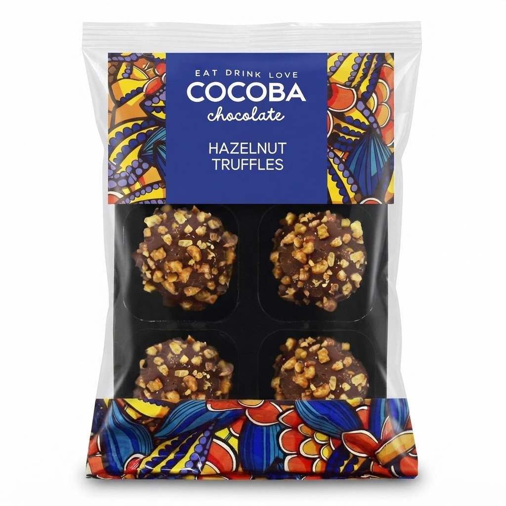 A package of Cocoba Chocolate Hazelnut Truffles in a clear plastic bag with a colorful label and patterned lower section. Four chocolate truffles are visible inside, each topped with chopped hazelnuts.