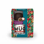 A boxed chocolate product on a white background. The package is decorated with a colorful tropical floral pattern and features a clear window showing a hot chocolate dome inside.