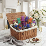 Beautiful wicker basket filled with chocolate treats including hot chocolate, truffles, buttons, and honeycomb plus two ceramic Cocoba mugs.