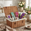 Wicker gift basket with Cocoba chocolate products on a kitchen counter
