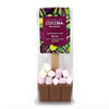 A packaged chocolate hot spoon treat from Cocoa Chocolate, featuring a brown milk chocolate base topped with pink and white marshmallows inside a clear bag with a colorful label.