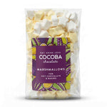 A clear plastic bag of Cocoba Chocolate Marshmallows for hot chocolate and baking, filled with pale yellow and white star-shaped marshmallows, with a purple label on the front.