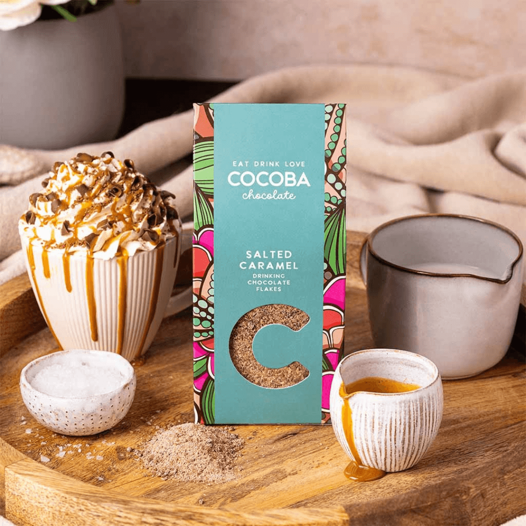 Salted Caramel Drinking Chocolate Flakes in a cosy setting with a Salted Caramel hot chocolate. 