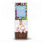 A packaged chocolate hot chocolate spoon from Cocoba Chocolate, featuring a brown chocolate base topped with pink and white marshmallows inside a clear plastic bag with a colorful label.
