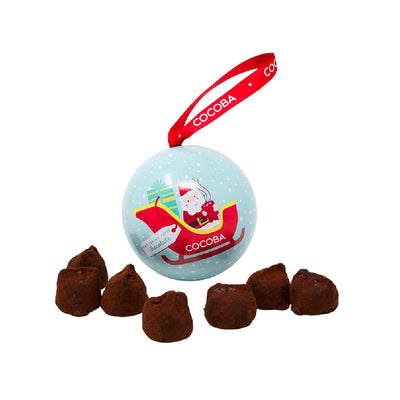 COCOBA Christmas ornament with Santa Claus design and chocolate salted toffee truffles on a white background