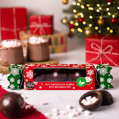 Vegan Dark Chocolate Hot Chocolate Bombe Christmas Cracker in a Christmas setting