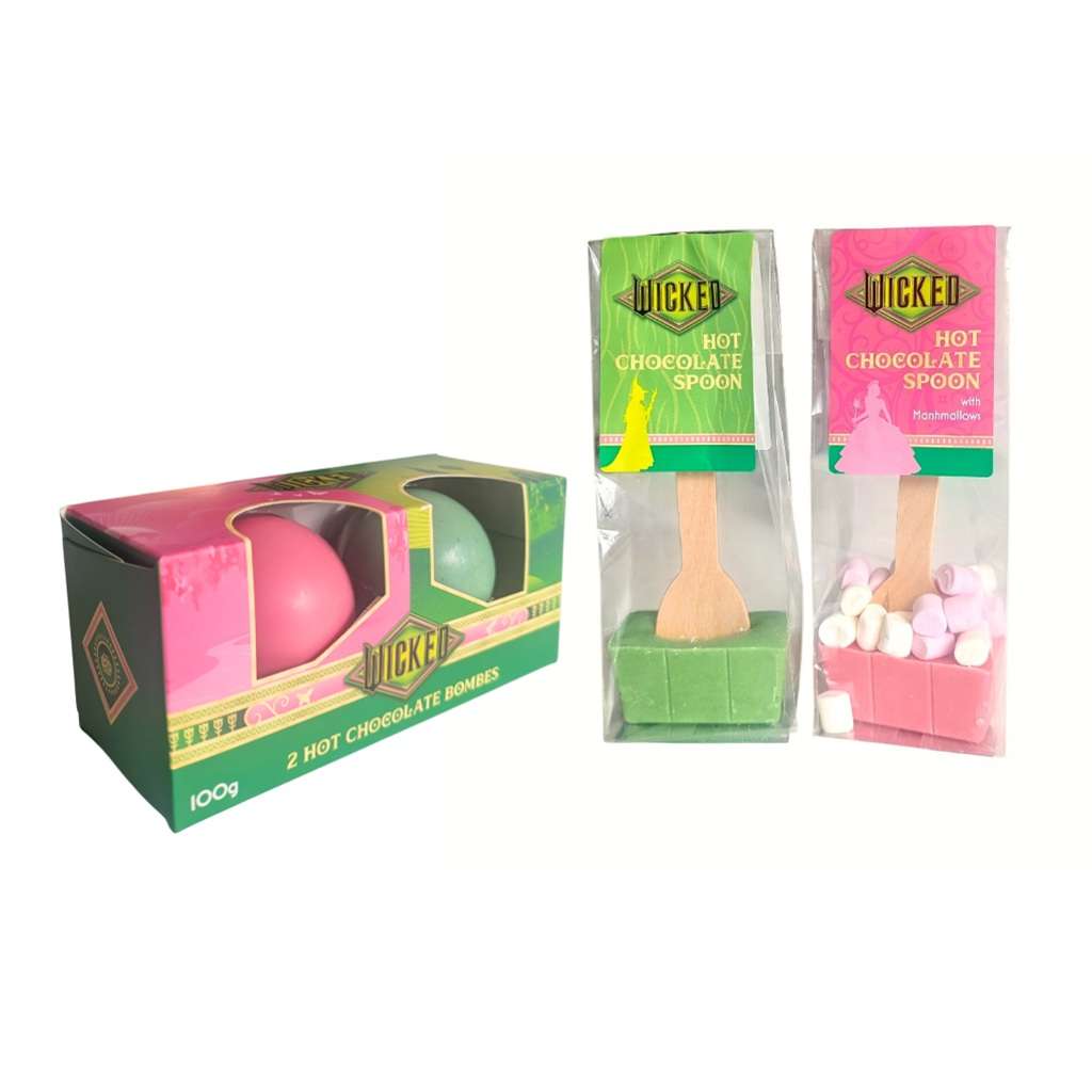 Wicked Hot Chocolate Spoons and hot chocolate bombes with pink sphere and green box on a white background