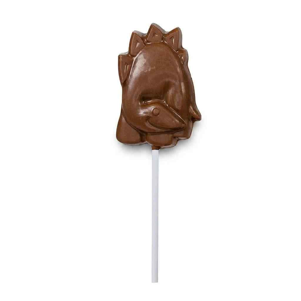 A chocolate-lollipop shaped like a stegosaurus, with a white stick, shown against a plain white background.