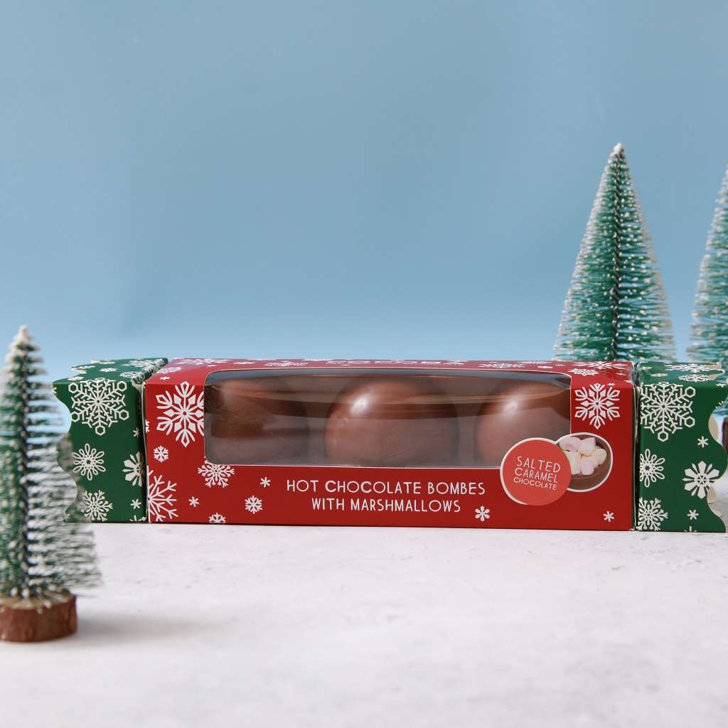 Salted Caramel Hot Chocolate Bombe Christmas Cracker with a Christmas scene