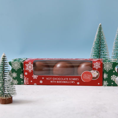 Salted Caramel Hot Chocolate Bombe Christmas Cracker with a Christmas scene